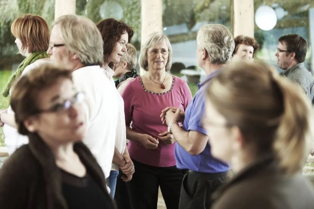 Participants connecting in conversation during a break, image 8 of 13